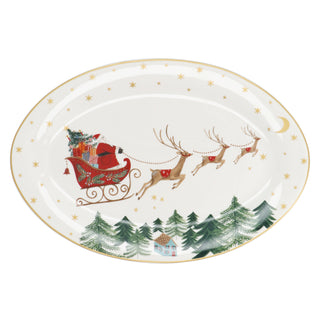 Oval bone china serving platter with Santa's sleigh and reindeer over pine forest with gold rim, Gisela Graham Christmas decoration