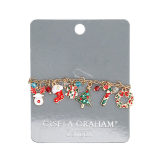 Gold charm bracelet with Christmas charms including reindeer tree stocking and candy cane, Gisela Graham