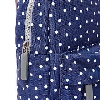 ROKA WILLESDEN SLING BAG IN NAVY POLKA DOT
