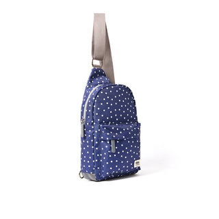 ROKA WILLESDEN SLING BAG IN NAVY POLKA DOT