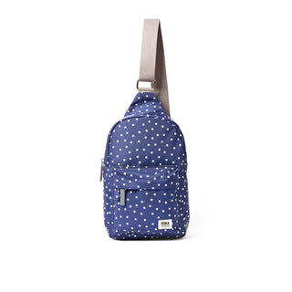 ROKA WILLESDEN SLING BAG IN NAVY POLKA DOT