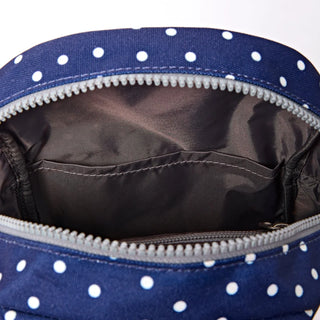 ROKA WILLESDEN SLING BAG IN NAVY POLKA DOT